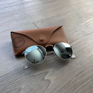 Ray-Ban round mirrored sunglasses.